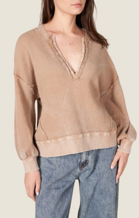 Taupe waffle knit long sleeve top with open placket, balloon sleeves, and raw edge detailing MT210266-TPE